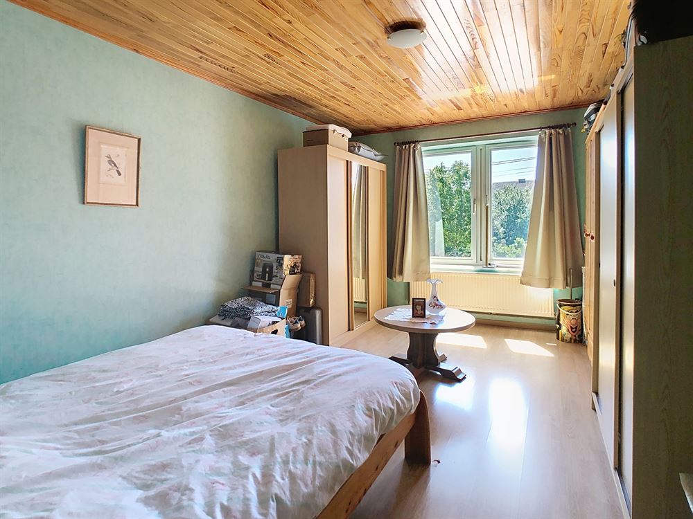 IMMEUBLE DE RAPPORT DE 3 APPARTMENTS ET 5 GARAGES AVEC JARDIN