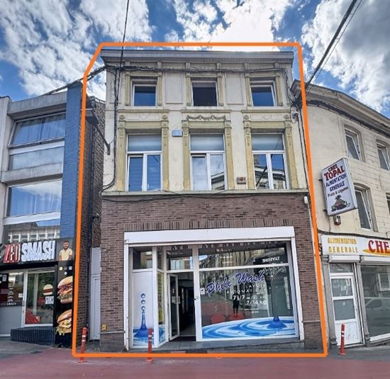 Immeuble de rapport - Deux beaux appartements et commerce occupé