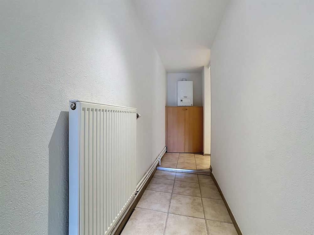 Immeuble de rapport - Deux beaux appartements et commerce occupé