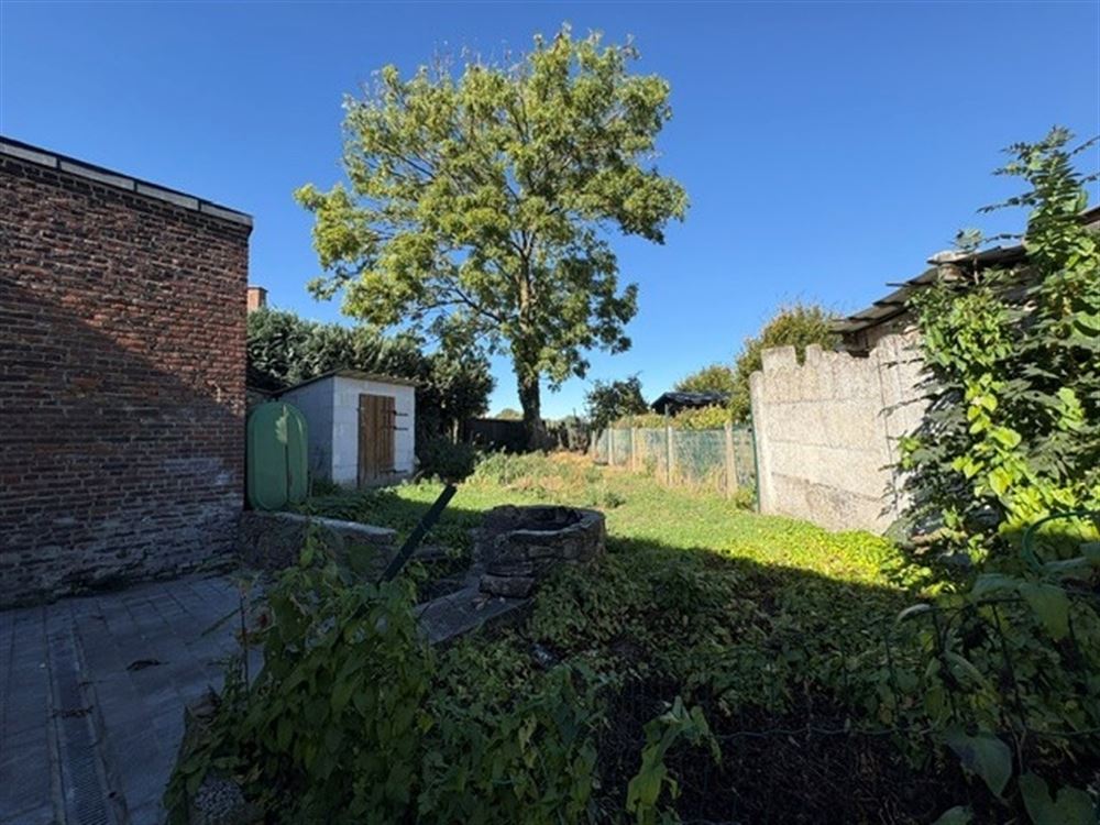 MAISON VILLAGEOISE AVEC JARDIN