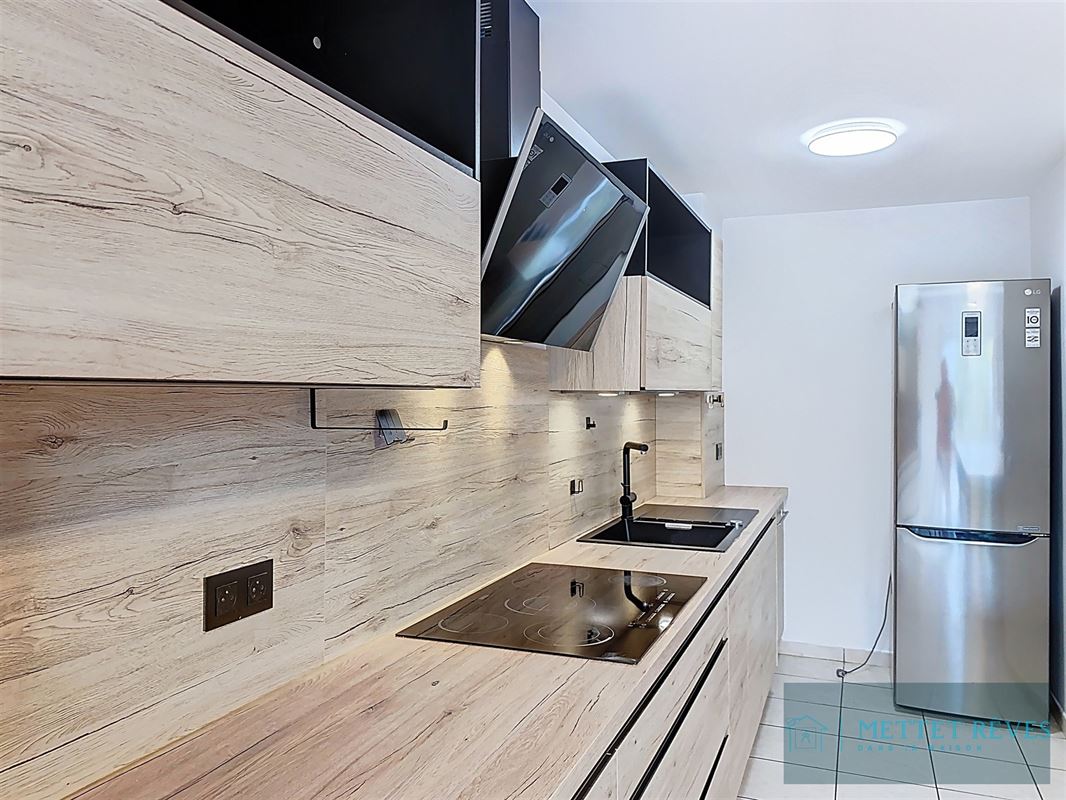 Spacieuse maison de 3 chambres avec cour et garage.