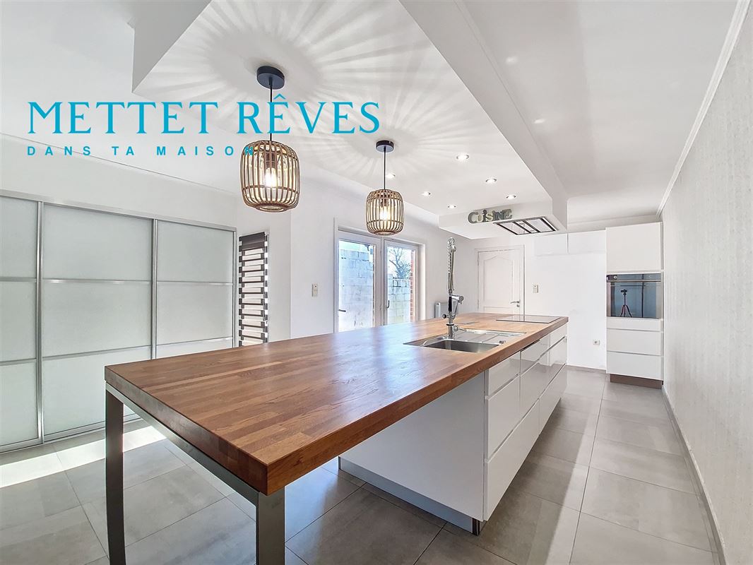 Maison de 185m2 de 3 chambres avec jardin.