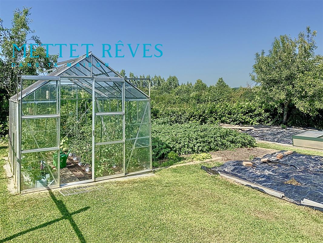 Villa 4 façades avec garage, agrémentée d’un grand jardin