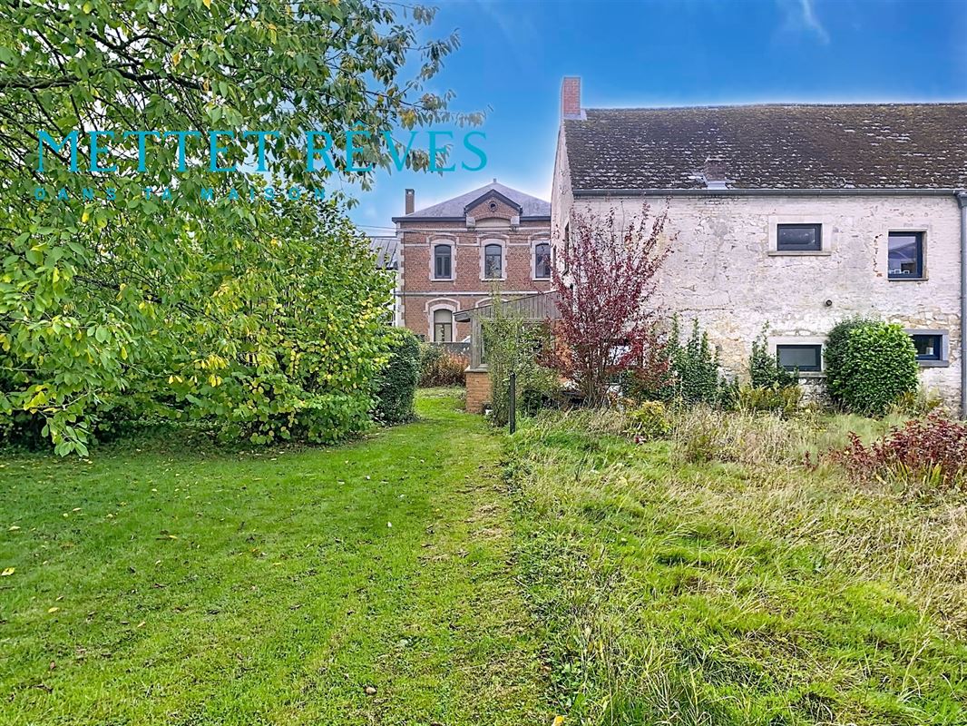 Maison de 3 façades+terrain à bâtir.
