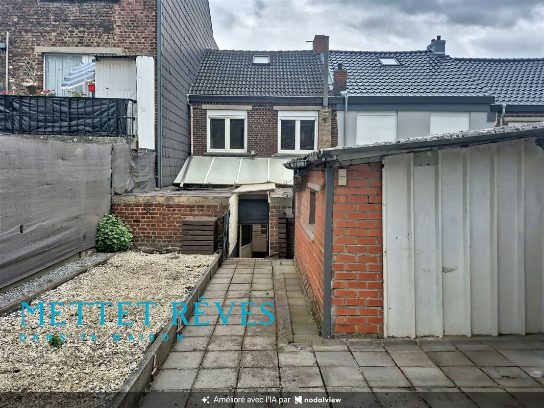 Maison de 3 à 4 ch. avec jardin et garage non attenant.