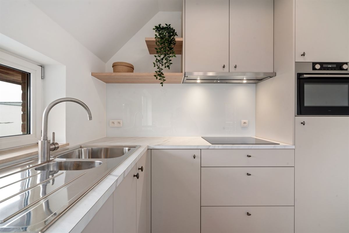 Instapklaar APPARTEMENT met 2 slaapkamers en autostaanplaats