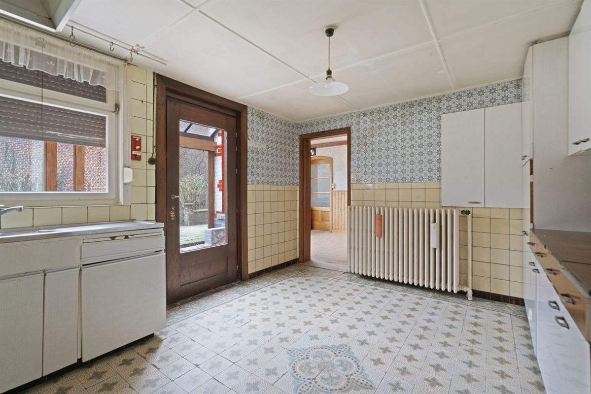 Karaktervolle te renoveren WONING (GB) met aanpalend perceel BOUWGROND