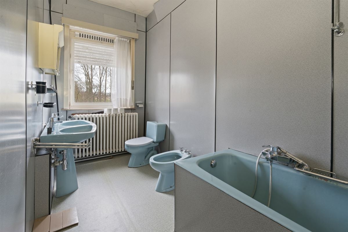 Karaktervolle te renoveren WONING (GB) met aanpalend perceel BOUWGROND