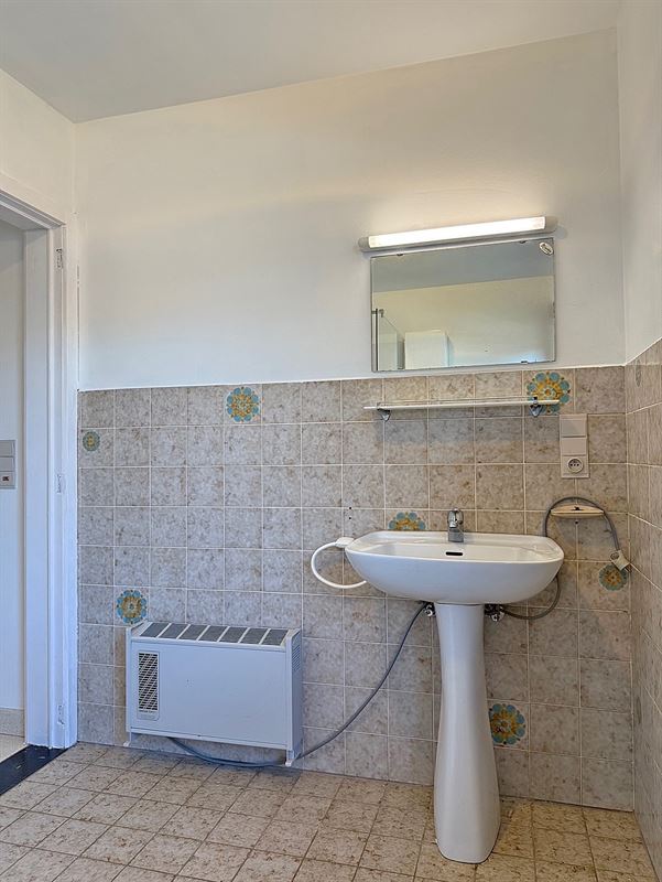 DORPSWONING met 3 slaapkamers, garage & tuin/terras