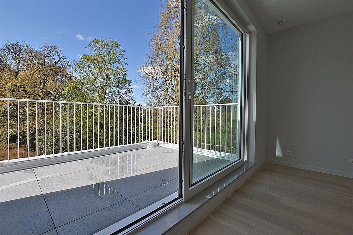 Instapklaar APPARTEMENT met 1 slaapkamer, bureau (of slaapkamer 2), terras, garage & staanplaats