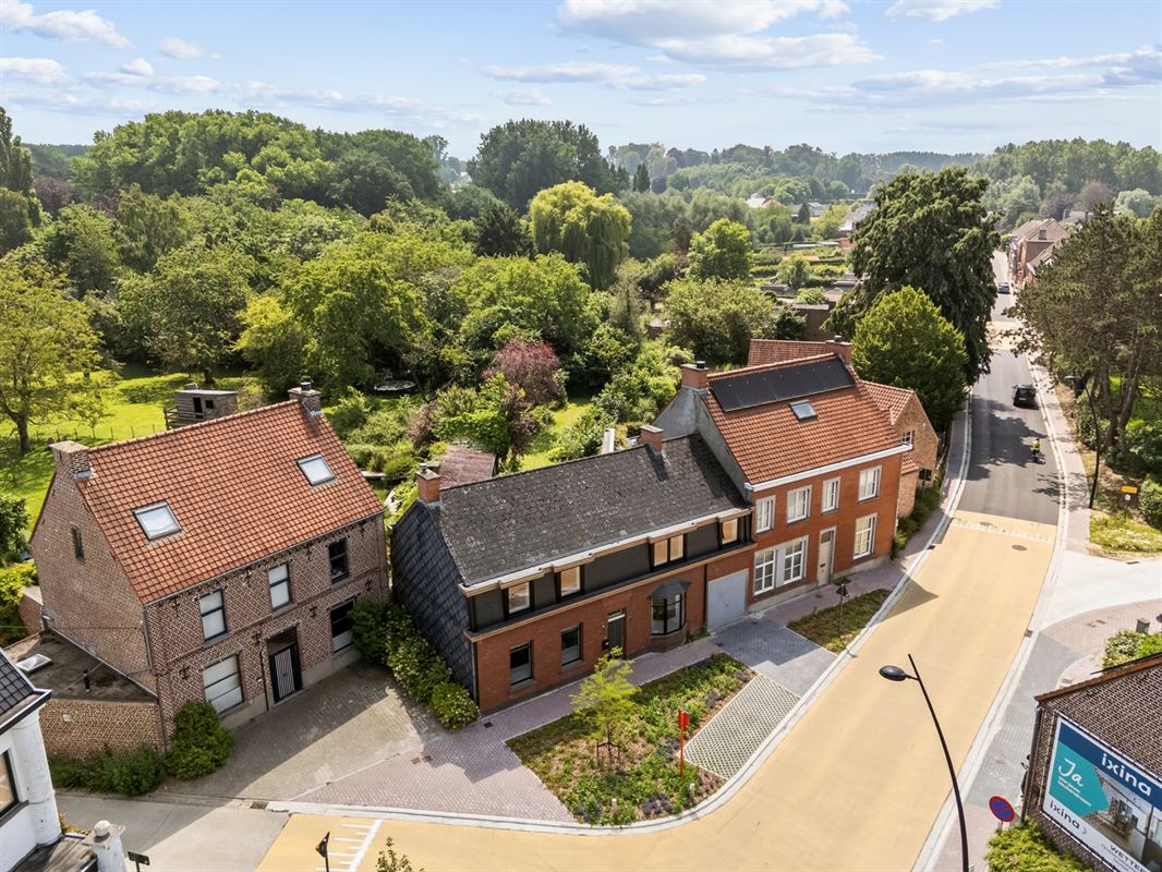 KARAKTERVOLLE WONING met 4 slaapkamers, garage & tuin op een perceel van ca. 811m²