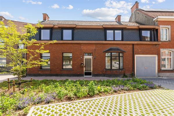 KARAKTERVOLLE WONING met 4 slaapkamers, garage & tuin op een perceel van ca. 811m²