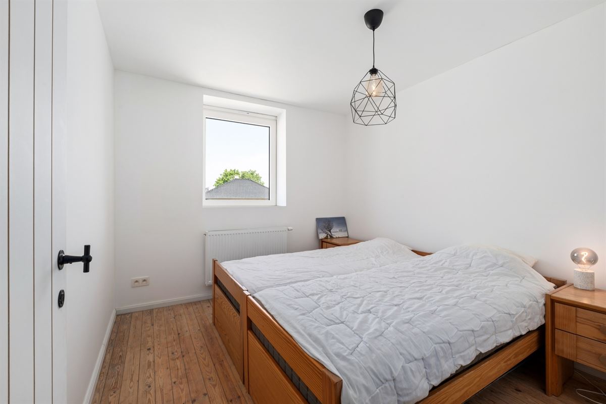 KARAKTERVOLLE WONING met 4 slaapkamers, garage & tuin op een perceel van ca. 811m²