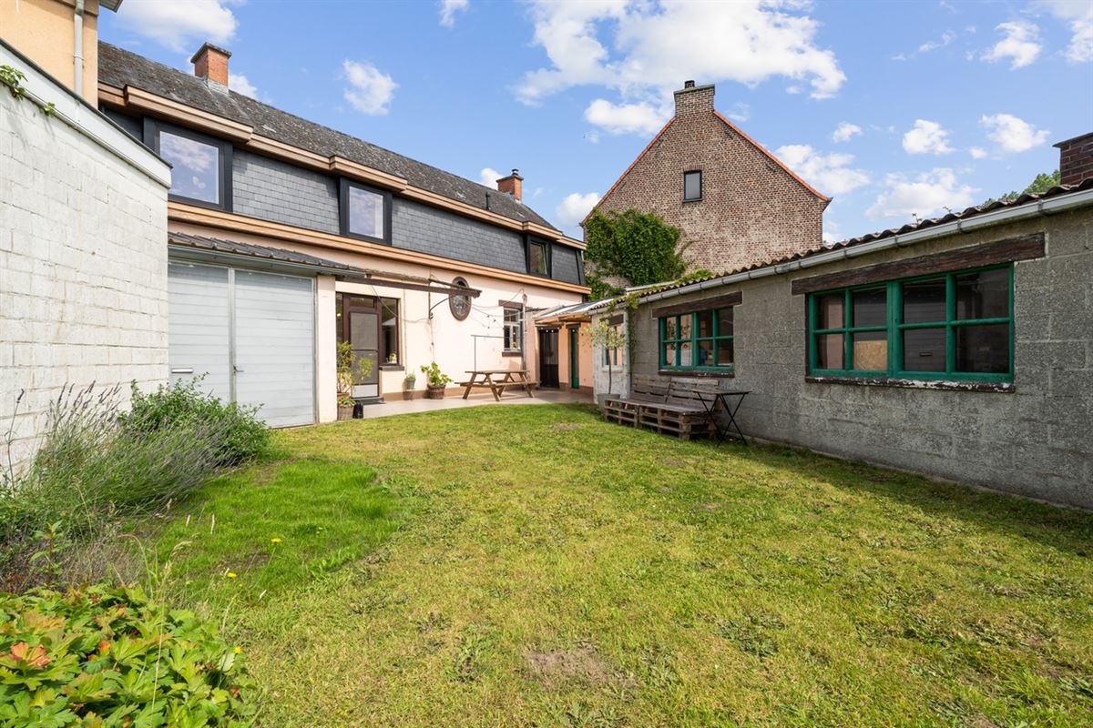 KARAKTERVOLLE WONING met 4 slaapkamers, garage & tuin op een perceel van ca. 811m²
