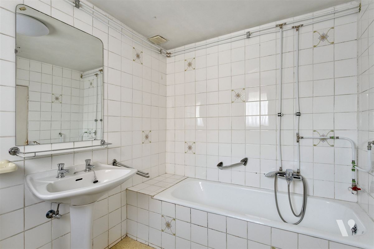 Gezellige gezinswoning met veel potentieel op een ruim perceel