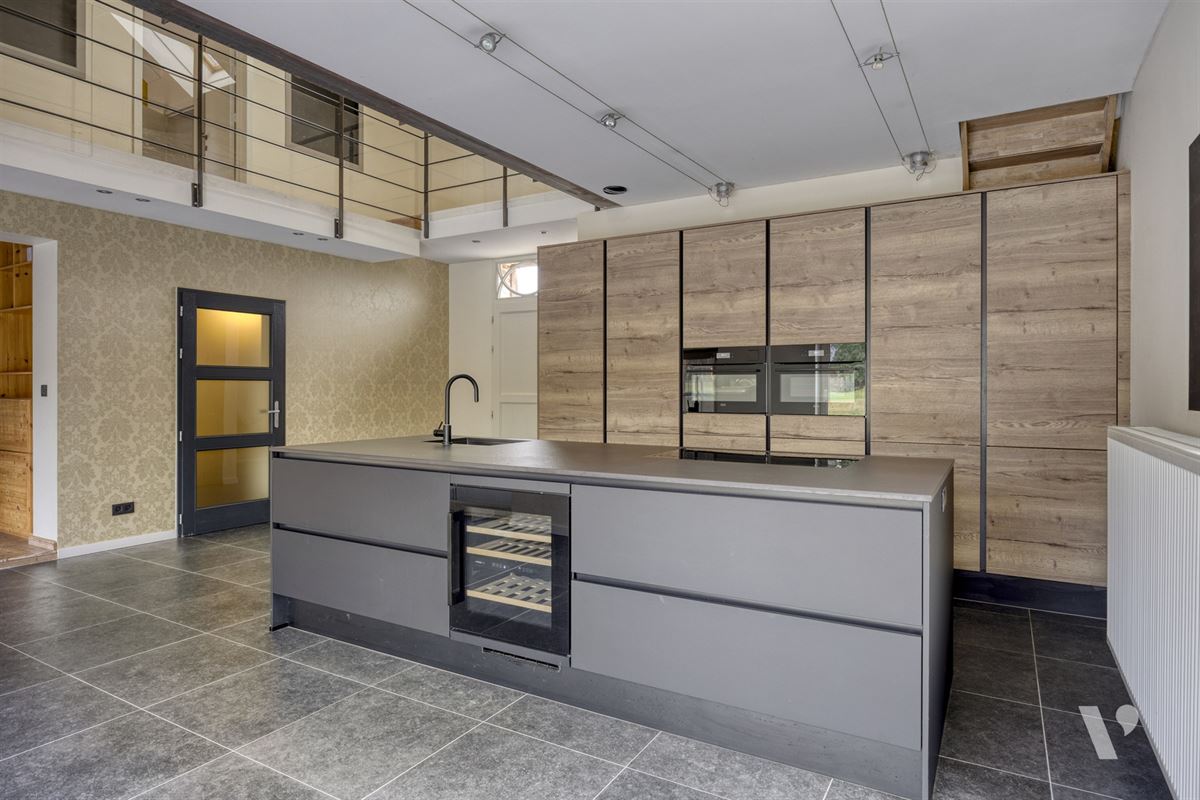 Prachtig gerenoveerde woning (279m²) met zwemvijver