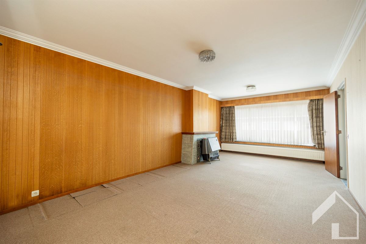 2-slaapkamerappartement met garage, tuin en extra kamer/atelier/berging/slaapkamer