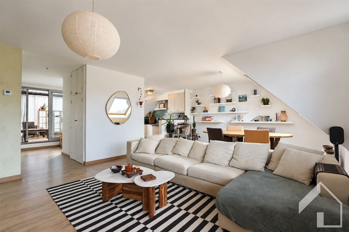 Ruim dakappartement met groot terras en staanplaats