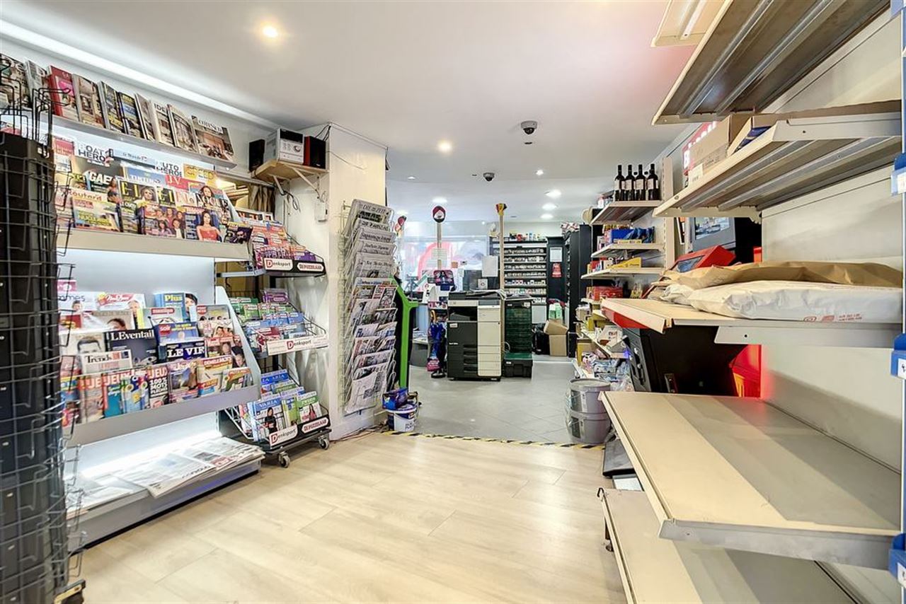 Opbrengstgebouw met handelsruimte en appartment