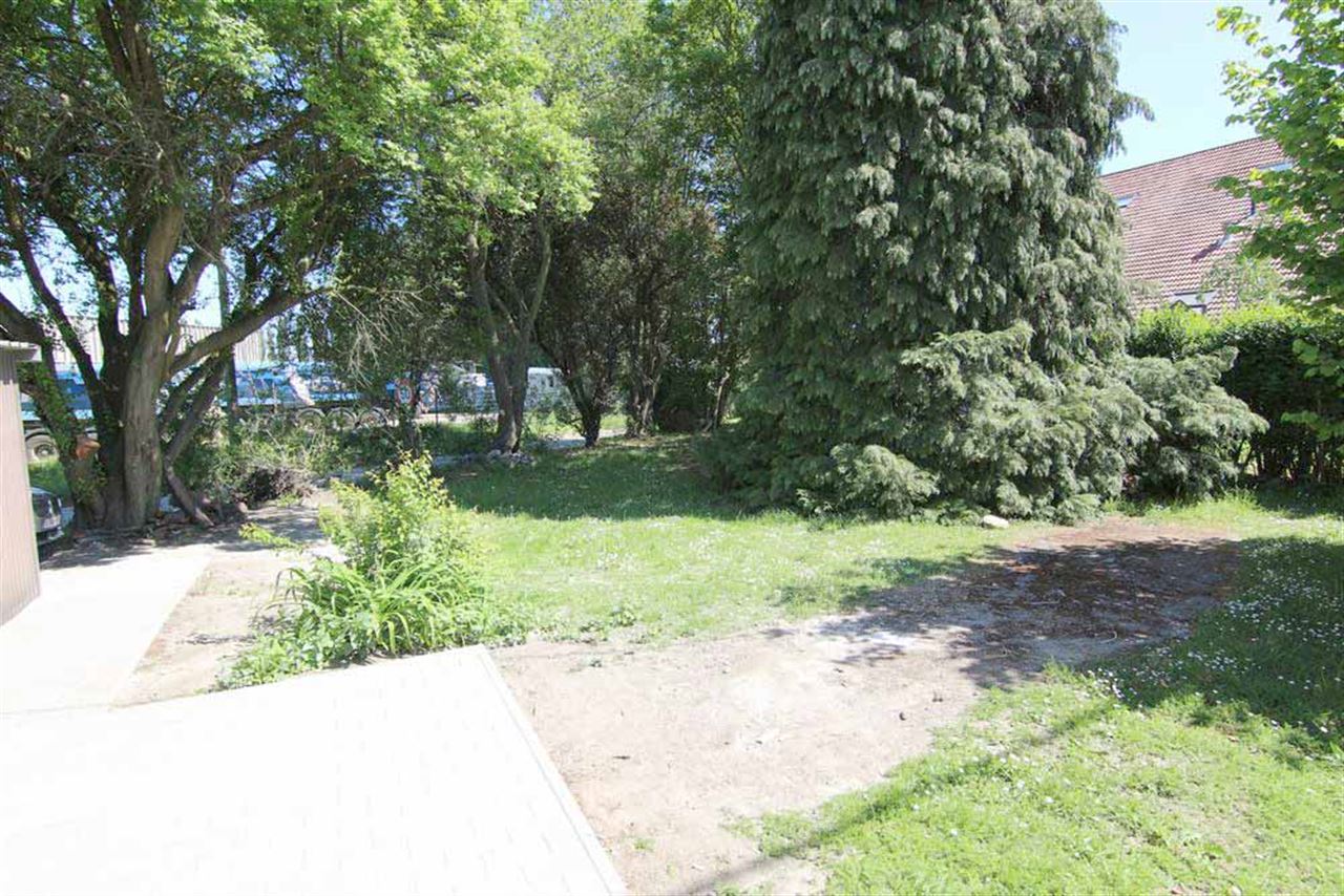 Volledig gerenoveerde woning met tuin