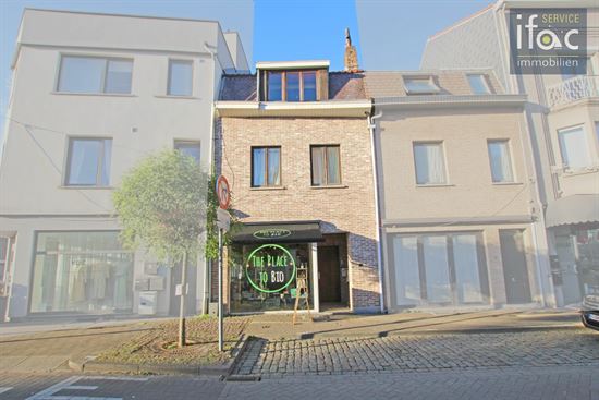 Opbrengsteigendom met 2 flats en handelsruimte Tervuren
