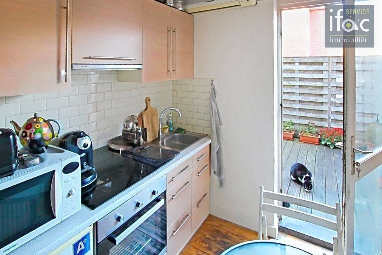 Opbrengsteigendom met 2 flats en handelsruimte Tervuren