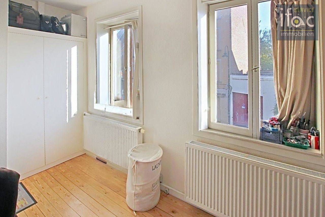 Opbrengsteigendom met 2 flats en handelsruimte Tervuren