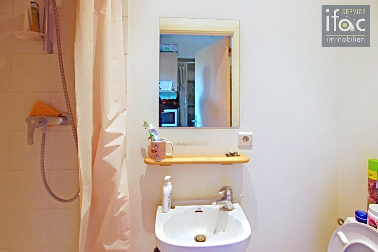 Opbrengsteigendom met 2 flats en handelsruimte Tervuren