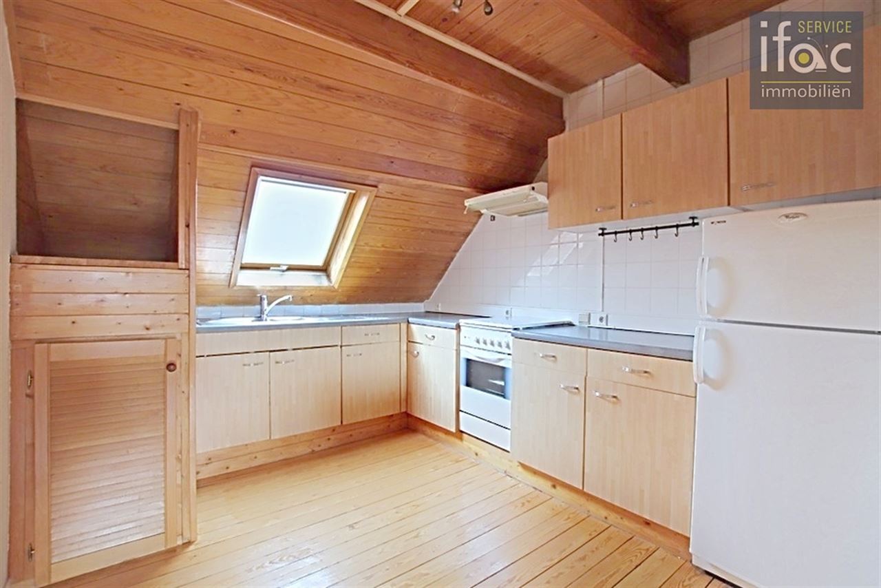 Opbrengsteigendom met 2 flats en handelsruimte Tervuren