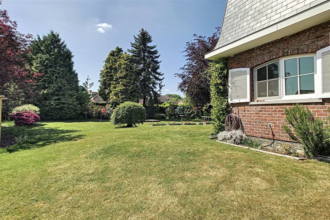 Charmante villa in residentiële omgeving met prachtig aangelegde tuin