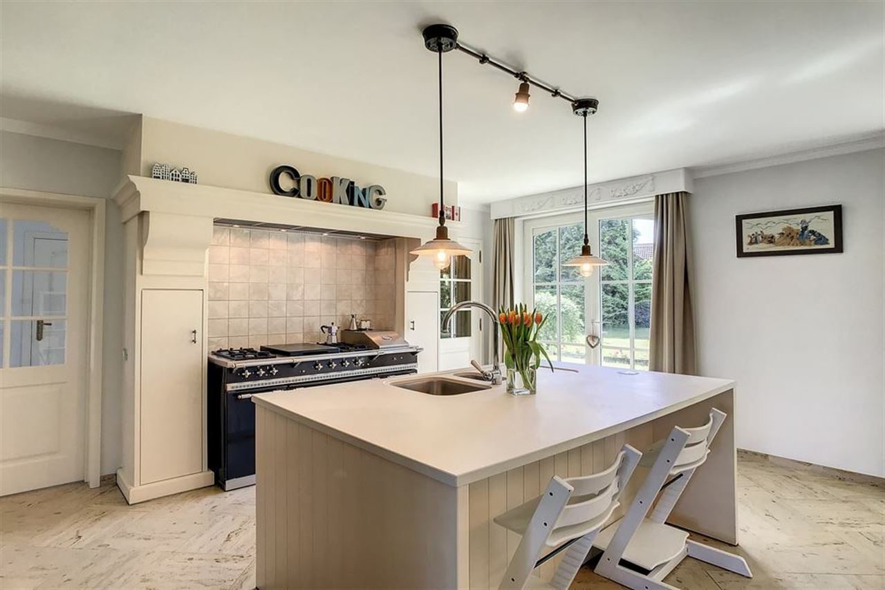 Charmante villa in residentiële omgeving met prachtig aangelegde tuin