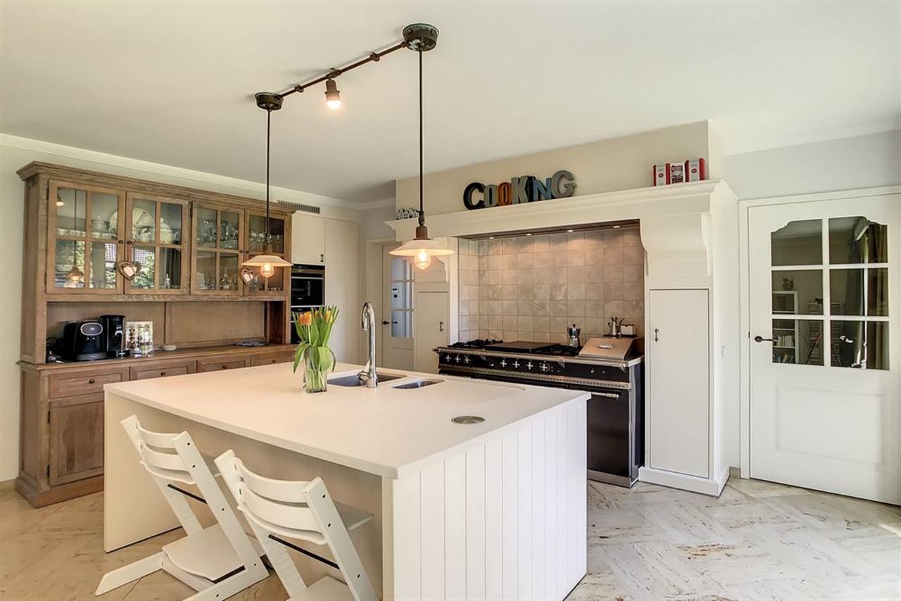 Charmante villa in residentiële omgeving met prachtig aangelegde tuin