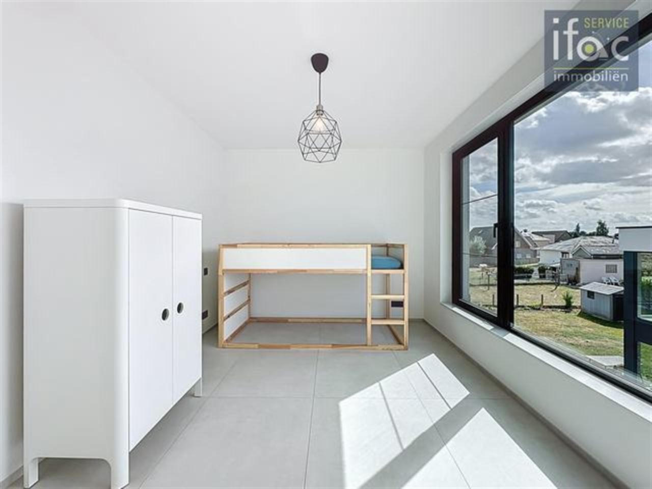 Energiezuinige villa met lichtrijke leefruimtes en grote tuin