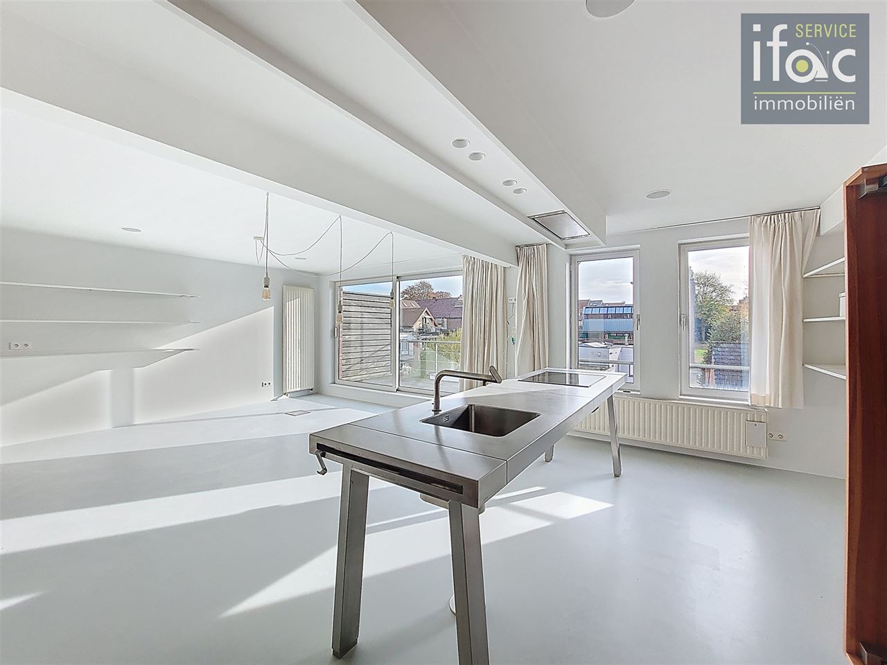 Luxe duplexappartement met zuidgericht terras in het centrum