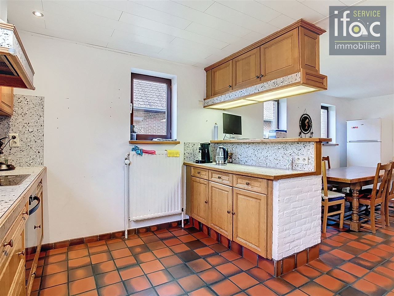 Huis met 4 slpks, 2 badk., tuin en garage