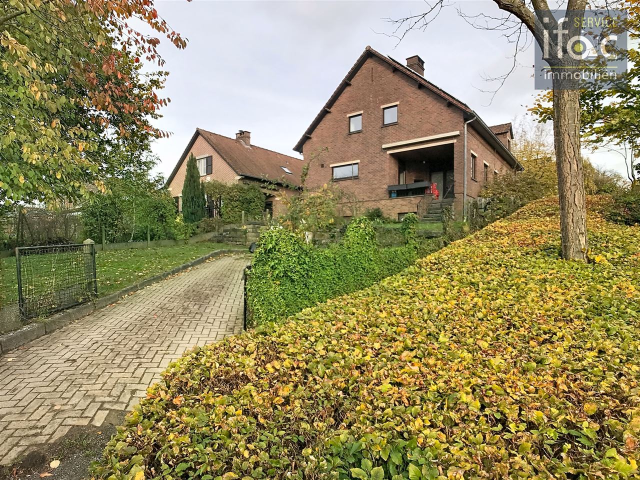 Huis met 4 slpks, 2 badk., tuin en garage