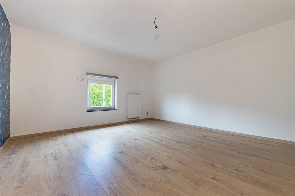 Hamoir - à vendre -Rez commercial et duplex avec jardin