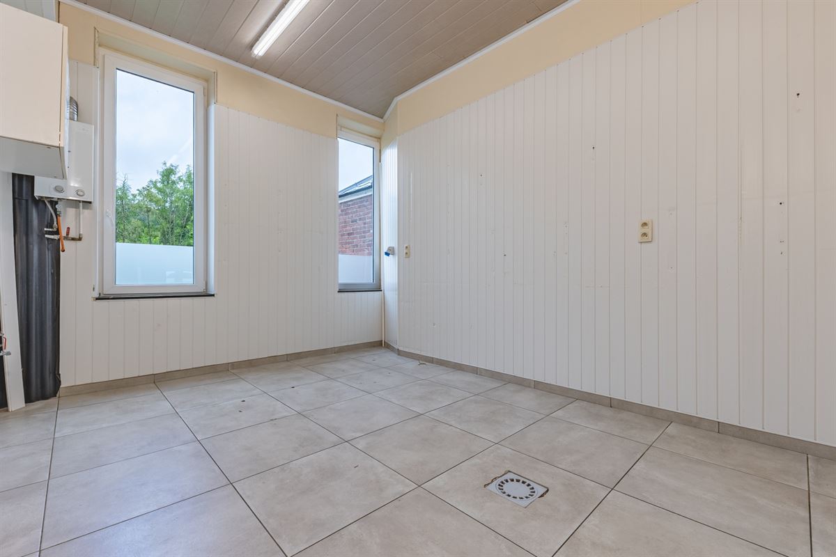 Hamoir - à vendre -Rez commercial et duplex avec jardin