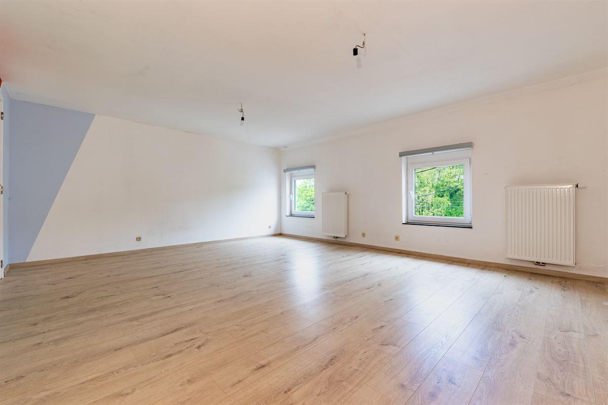 Hamoir - à vendre -Rez commercial et duplex avec jardin