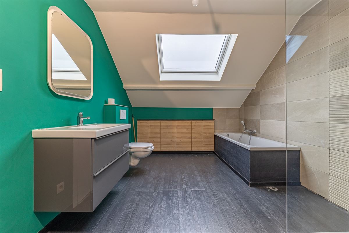 Hamoir - à vendre -Rez commercial et duplex avec jardin