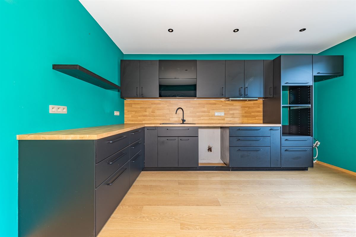 Hamoir - à vendre -Rez commercial et duplex avec jardin