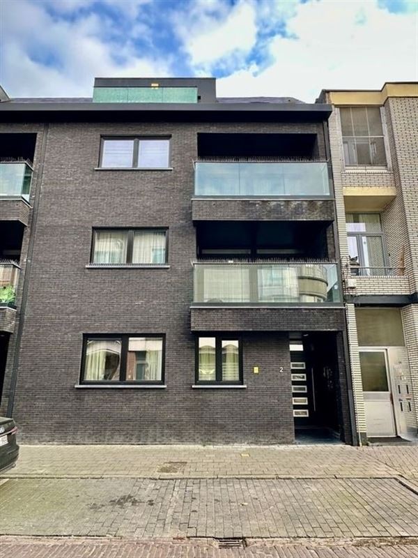 Gelijkvloers appartement met 2 slaapkamers en terras.