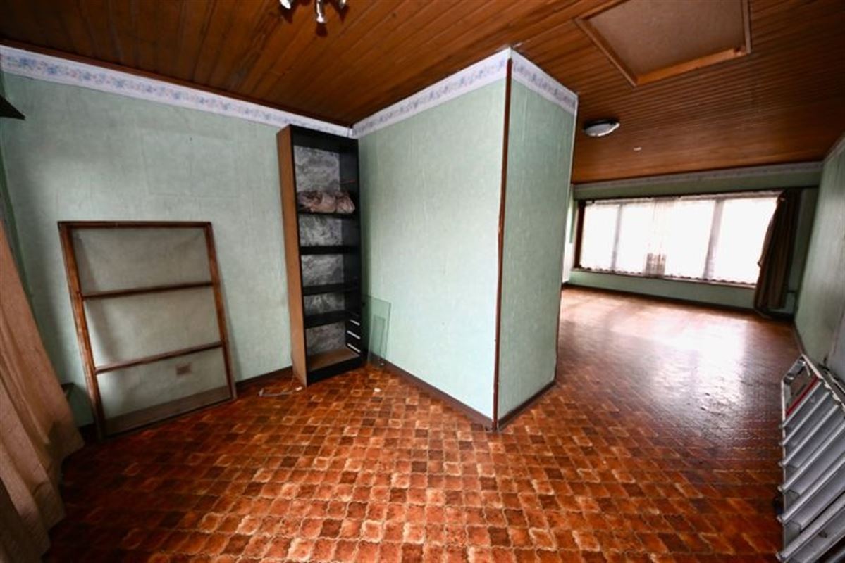 Te renoveren woning met 2 slaapkamers en tuin.
