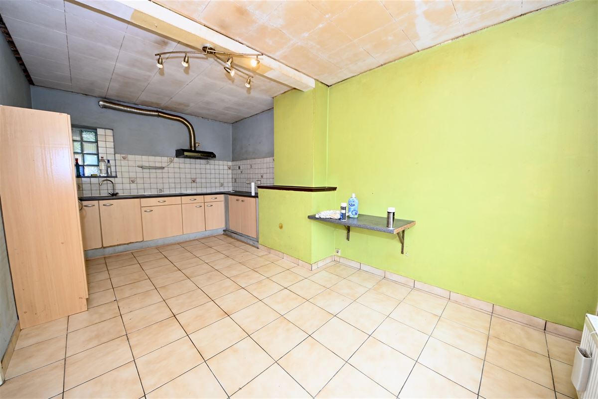 Te renoveren woning met 2 slaapkamers en tuin. 