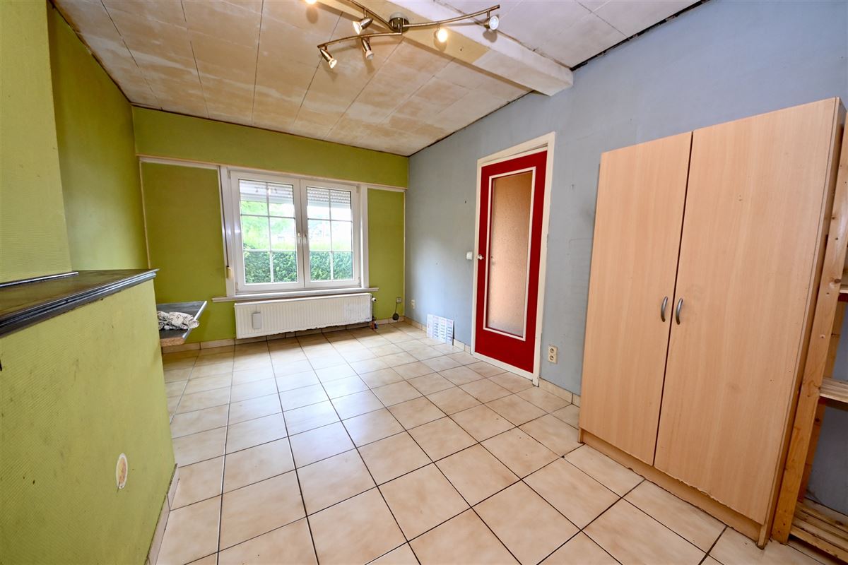 Te renoveren woning met 2 slaapkamers en tuin. 
