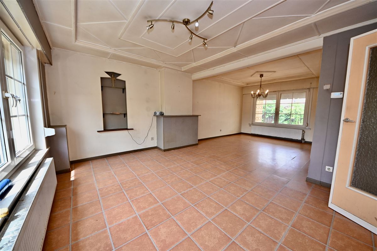 Te renoveren woning met 2 slaapkamers en tuin. 