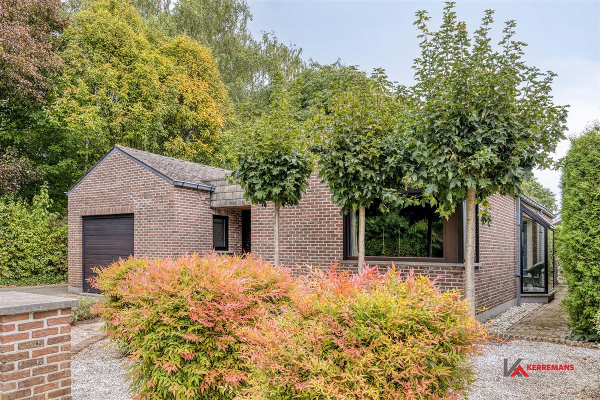 Laagbouwwoning met 3 slaapkamers, garage en tuin. 