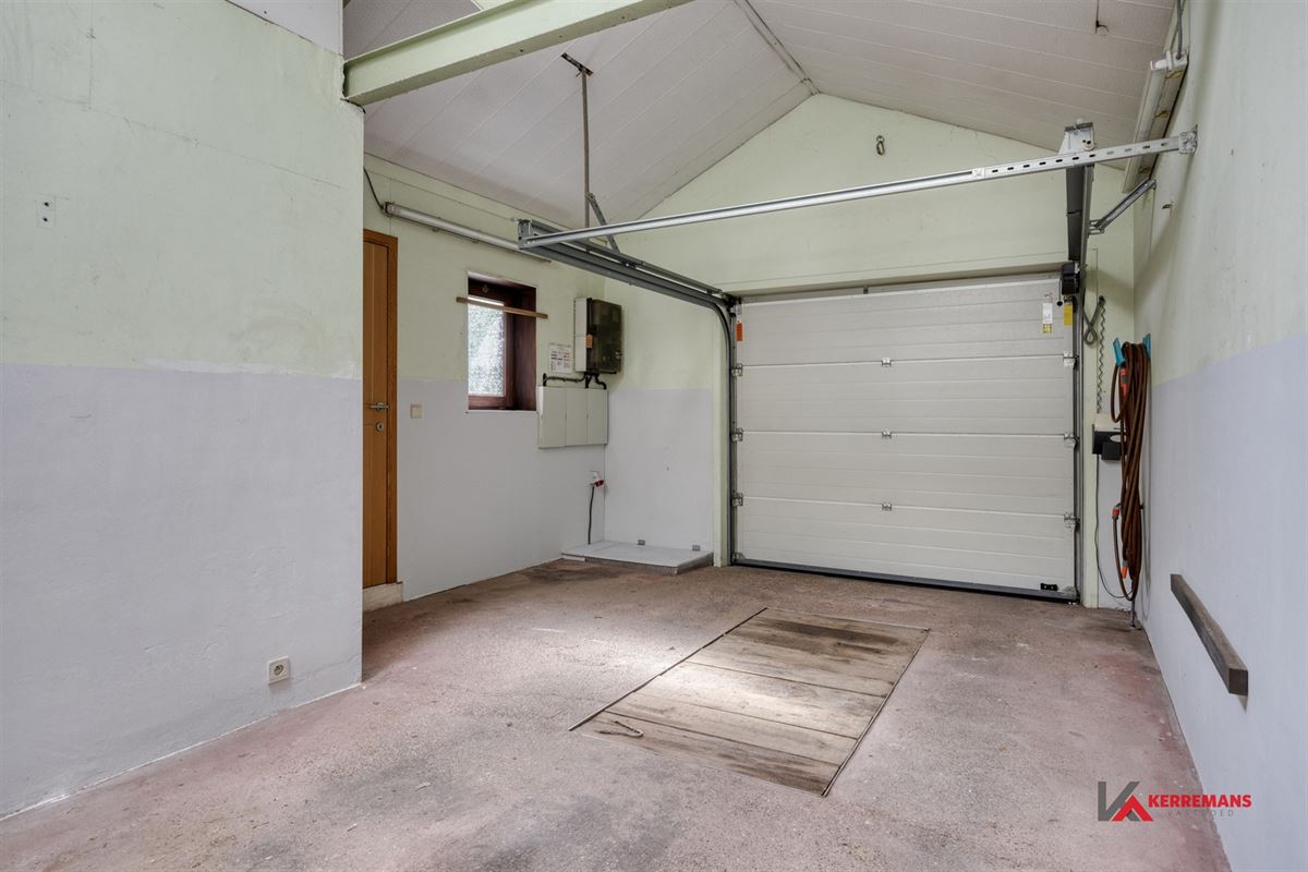 Laagbouwwoning met 3 slaapkamers, garage en tuin. 