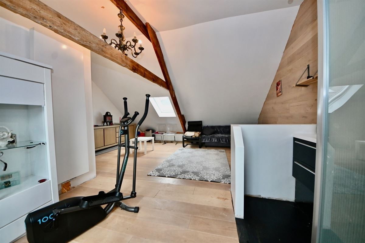 Gerenoveerde woning met 4 slaapkamers en tuin.