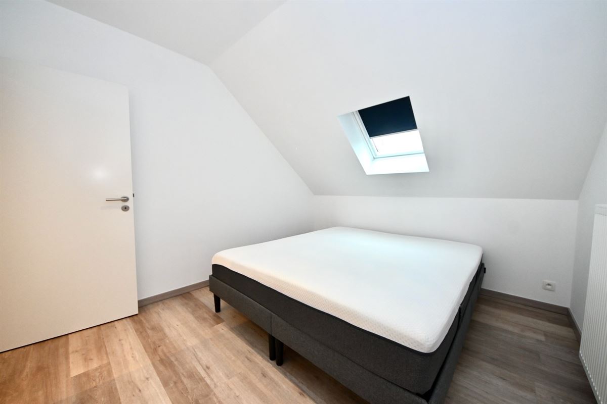 Duplex appartement met 2 slaapkamers en terras.